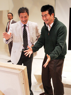 Art_2 Chau as Serge and Yu as Yvan admire the Antrios while White as Marc, looks on in disgust.