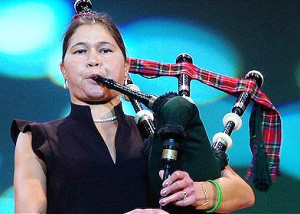 Isabel plays bagpipes last fall in Sendai. She took up the instrument after her transplant to celebrate her newly-given lung power. (Courtesy Isabel Stenzel)