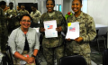 Rep. Tammy Duckworth distributes cards from second-graders at Stone School in Addison, Ill. and Highland Elementary School in Elgin, Ill. at a Mother’s Day dinner for U.S. service women at Camp Eggers in Kabul.